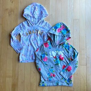 Pair of hooded long sleeve tee shirts